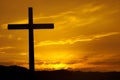 Christian cross over beautiful sunset background Royalty Free Stock Photo