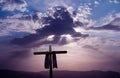 Christian cross over dark sunset background Royalty Free Stock Photo