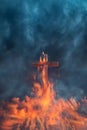 Christian cross in red clouds and fire against a stormy sky. Royalty Free Stock Photo