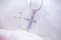 Christian cross to wear on the body after baptism Royalty Free Stock Photo