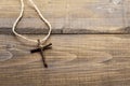 Christian cross on a wooden surface Royalty Free Stock Photo