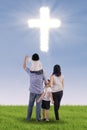 Christian family with a cross Royalty Free Stock Photo