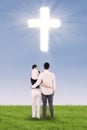 Christian family and cross symbol Royalty Free Stock Photo