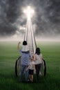 Christian family on the stairs Royalty Free Stock Photo