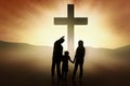 Christian family standing at the Cross Royalty Free Stock Photo