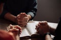 Christian group are praying to god with the bible and sharing the gospel Royalty Free Stock Photo