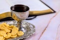 Christian Holy Communion with unleavened bread, wine, chalice, and symbols of Christ the Savior Royalty Free Stock Photo