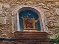 Christian Icon on Old Stone Wall, Girona, Spain