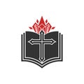 The cross of the Lord Jesus Christ, an open Bible and a flame of fire are a symbol of the Holy Spirit. Royalty Free Stock Photo