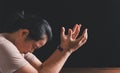 Christian life crisis prayer to god. Woman Pray for god blessing to wishing have a better life. woman hands praying to god with Royalty Free Stock Photo