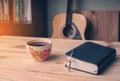 Christian man Bible study. Bible, books and guitar worship God. freedom. Worship of God that respects and loves our God. Royalty Free Stock Photo