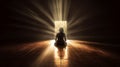 Christian man praying on floor by window with rays of golden light streaming through Royalty Free Stock Photo