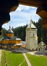 Christian monastery view through the wooden window Royalty Free Stock Photo
