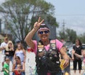 Christian Motorcycle Club lady in parade in small town America