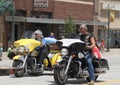 Christian Motorcycle Club Riders in parade in small town America