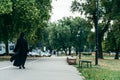 Christian nuns walking down the street