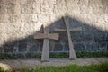 Christian Ortdox Wooden Crosses in the Ancient Byzantine Style on Background of the Stone Wall of the Ancient Temple Royalty Free Stock Photo