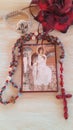 Rosary and icon of saint
