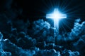 Christian religion concept shining cross on dramatic cloudy night sky background. Dark sky with cross and cloud. Divine shining