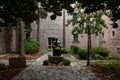 Christian religious bronze sculpture inside a courtyard