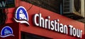 Christian Tour Logo on the wall of the travel agency in Bucharest, Romania, 2019