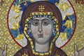 The Christian Virgin and Child Jesus in the form of ceramic mosaics on the facade of the Orthodox church. Traditional christian Royalty Free Stock Photo