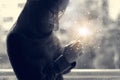 Christian woman with cross in hands praying hope and worship on the raindrop background. Abstract lighting. Eucharist therapy bles Royalty Free Stock Photo