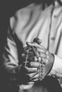 Christianity background of man hand holding rosary praying for god blessing Royalty Free Stock Photo