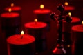 Christianity, faith and religious belief concept with a candlelight scene of a crucifix representing Jesus Christ on the cross and Royalty Free Stock Photo