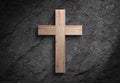 Christianity wooden cross jesus christ sign dark stone wall Royalty Free Stock Photo