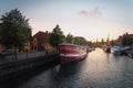 Christians Brygge canal and boats at sunset - Copenhagen, Denmark Royalty Free Stock Photo