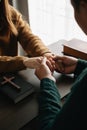 Christians are congregants join hands to pray and seek the blessings of God Royalty Free Stock Photo