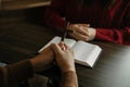 Christians are congregants join hands to pray and seek the blessings of God, the Holy Bible Royalty Free Stock Photo