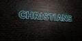 CHRISTIANS -Realistic Neon Sign on Brick Wall background - 3D rendered royalty free stock image Royalty Free Stock Photo