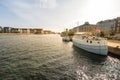 Christianshavn neighborhood canal with boats moored at sunset in the city of Copenhagen Royalty Free Stock Photo