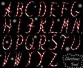 Christmas abc from capital letters. Alphabet isolated on black background.