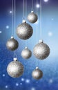 Christmas abstract background with blue glistening balls