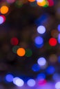 Christmas abstract blurred background. Multi-colored lights. Unfocused image. Christmas tree garland in a blur Royalty Free Stock Photo