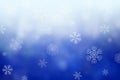 Christmas abstract winter shiny snow bokeh background with unique snowflakes Royalty Free Stock Photo