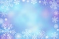 Christmas abstract winter shiny snow bokeh background with unique snowflakes Royalty Free Stock Photo