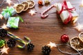 Christmas accessories, gifts, candy, oranges, top view on a dark background. New year or Christmas background with space