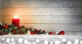 Christmas or Advent wood background with a candle Royalty Free Stock Photo