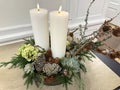 Christmas Advent wreath with two lit white candles on table Royalty Free Stock Photo