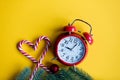 Christmas alarm clock and lolipop Royalty Free Stock Photo