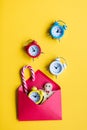 Christmas alarm clock and red envelope Royalty Free Stock Photo