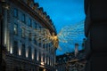 Christmas Angel Lights at Night in Festive Regent Street in Busy London, UK Royalty Free Stock Photo