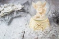 Christmas angel statuette on silver background Royalty Free Stock Photo