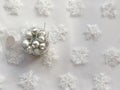 Christmas angel toy across white background with snowflakes. Christmas conceptBox with christmas silver balls across white snowfla Royalty Free Stock Photo