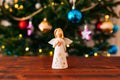 Christmas angel on a wooden table Royalty Free Stock Photo