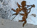 Christmas angels in frozen window